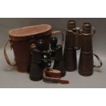 Two pairs of binoculars, Tasco 8 x 56, Lieberman & Gortz 12 x 50, cased, and 22 bullet holder.