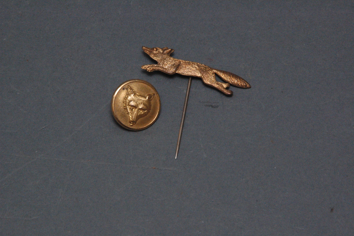 Firmin & Son London hunt button, parallel lines with fox head, and running fox stick pin,