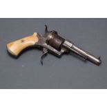 Pin fire revolver, six shot, engraved action, folding trigger and ivory handle.  Length 19 cm.