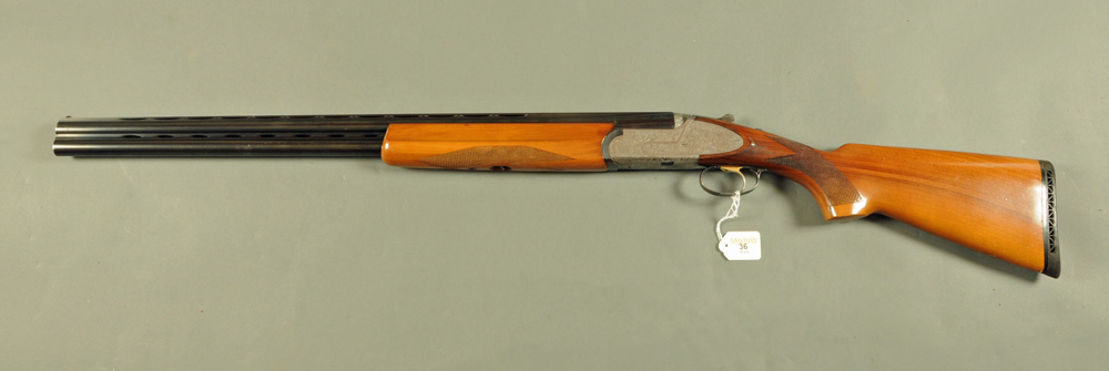 Rizzini 12 bore over/under shotgun, 28 inch barrels, 3/4 and 1/2 choke, ejector, side plate,