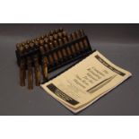 40 once fired 7 mm Remington Magnum cases with 7 mm reloading manual.