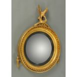 A Regency giltwood and gesso convex mirror,