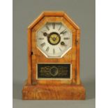 A Victorian walnut American alarm mantle clock, two-train striking movement.  Height 25 cm.