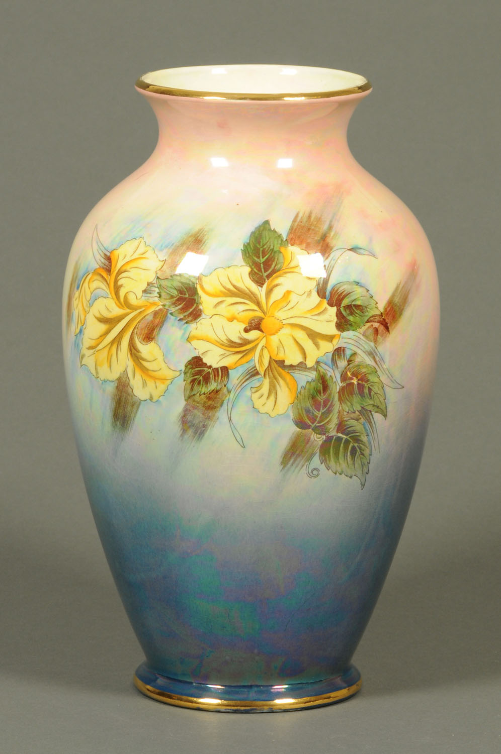 A large Royal Winton vase, with floral spray to either side.  Height 37 cm.