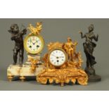 A spelter cased French clock, and a Mystery clock stand and a French Cupid clock with marble.