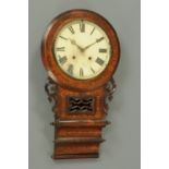 A Victorian marquetry wall clock, with eight day American striking movement.  Height 77 cm.