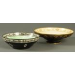 Two Royal Worcester decorative bowls, each with black ground.  Largest diameter 26.5 cm.