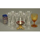 A set of six air twist stem glasses, with circular spreading feet, an ivory mounted ring stand,
