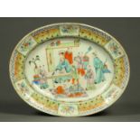 A 19th century Chinese oval platter, in Canton colours.  Length 37 cm.  CONDITION REPORT: Other than
