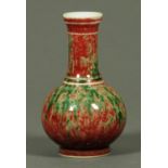 A Chinese club shaped vase, with six character mark to base, with red and green mottled glaze.