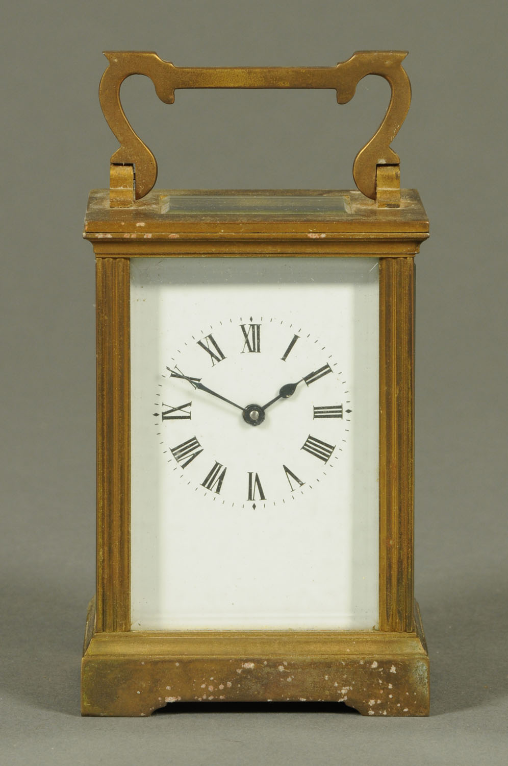 An Edwardian brass cased carriage clock, timepiece only, with ribbed square corner pillars.