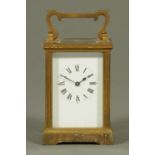 An Edwardian brass cased carriage clock, timepiece only, with ribbed square corner pillars.