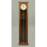 A Synchronome three volt electric clock, pre 1930, Serial No. 11446, in mahogany case.  Height 127.5