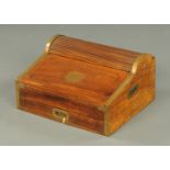 A camphorwood stationery box, brass bound and with recessed carrying handle to either side.  Width