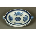 A Chinese blue and white plate warming dish, with handle to either side.  Width 28.5 cm. CONDITION