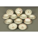 A collection of two tea bowls and saucers, probably Newhall, and ten saucers,