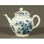 An 18th century Worcester blue and white teapot, decorated with flowers and butterflies, marked "