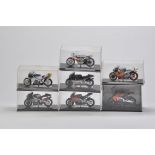 Various IXO 1/24 scale Super Bike Models. Including Rossi, Capirossi  etc. A in Display Boxes. (7)