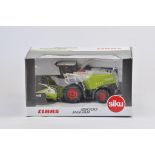 Scarce Siku 1/32 Scale Claas Jaguar 25000 Forage Harvester. Special Commemorative Helmut Claas