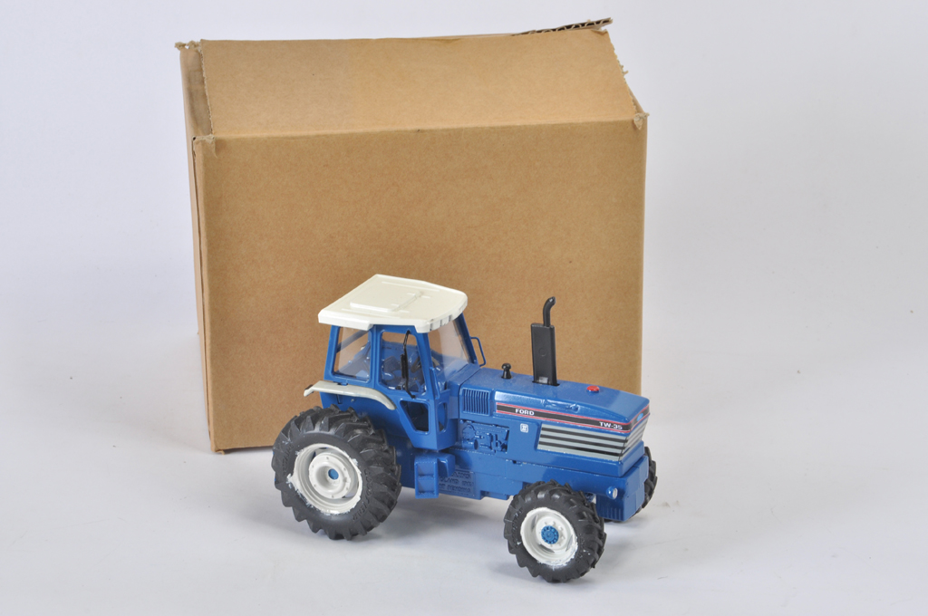 Scarce DBP Models Ford TW35. Some chemical reaction on wheels. Otherwise B / A with box.