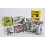 Another interesting group of Novelty Toys including Santa Wagon, Happy Panda, Skiing Bear and