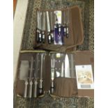 A nine piece kitchen knife set in case,