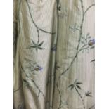 Two pairs of silk interlined curtains, the white and green striped ground set with floral sprays