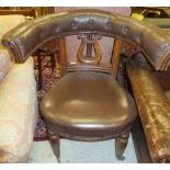 A Victorian oak framed reading chair, th