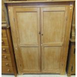 A 19th Century stripped pine two door cupboard enclosing four shelves CONDITION REPORTS Size