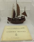 An Oriental model of a Chinese junk, together with another model of a tall masted ship, a brass