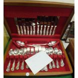 A mahogany canteen of cutlery stamped "F
