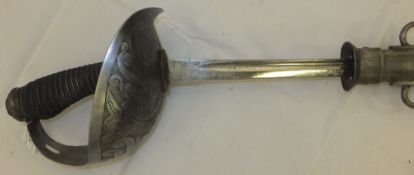 A 1912 pattern cavalry officer's sword by Wilkinson with scabbard CONDITION REPORTS Blade approx