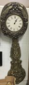 A gilt comtoise wall clock with Arabic a