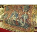 A Flemish tapestry wall hanging in the 17th Century manner depicting figures in a tent, inscribed "A