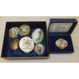 A collection of five various Halcyon Days enamelled boxes, together with two further enamelled boxes