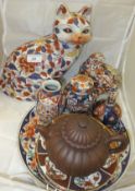 A collection of Chinese and Japanese ceramics to include a gourd-shaped teapot, a figure of a cat,