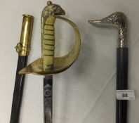 A reproduction RAF officer's dress sword by Burberry Haymarket London SW, with pierced brass knuckle