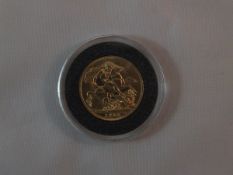 A George V gold sovereign, dated 1913
