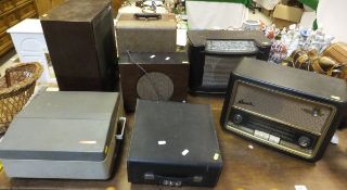 Seven various bakelite, walnut cased and other radios, a Celestion loud speaker, Imperial manual