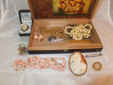 A box of assorted jewellery to include a