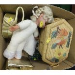 A modern doll and box of various sewing