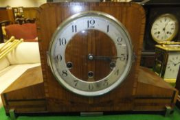 A walnut cased Art Deco mantel clock wit