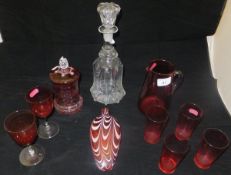 A Nailsea cranberry glass flagon with wh