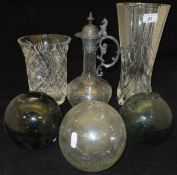 A heavy cut glass vase, one other vase,