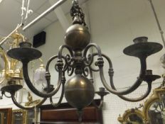 A brass ceiling light fitting in the 18th Century Dutch manner CONDITION REPORTS Please note that