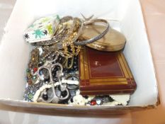 A box containing assorted costume jewell