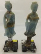 A pair of Chinese carved blue onyx figur