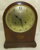 A mahogany cased mantel clock eight day