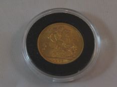A modern gold sovereign, dated 1965