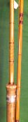 A three piece split cane salmon fly rod,